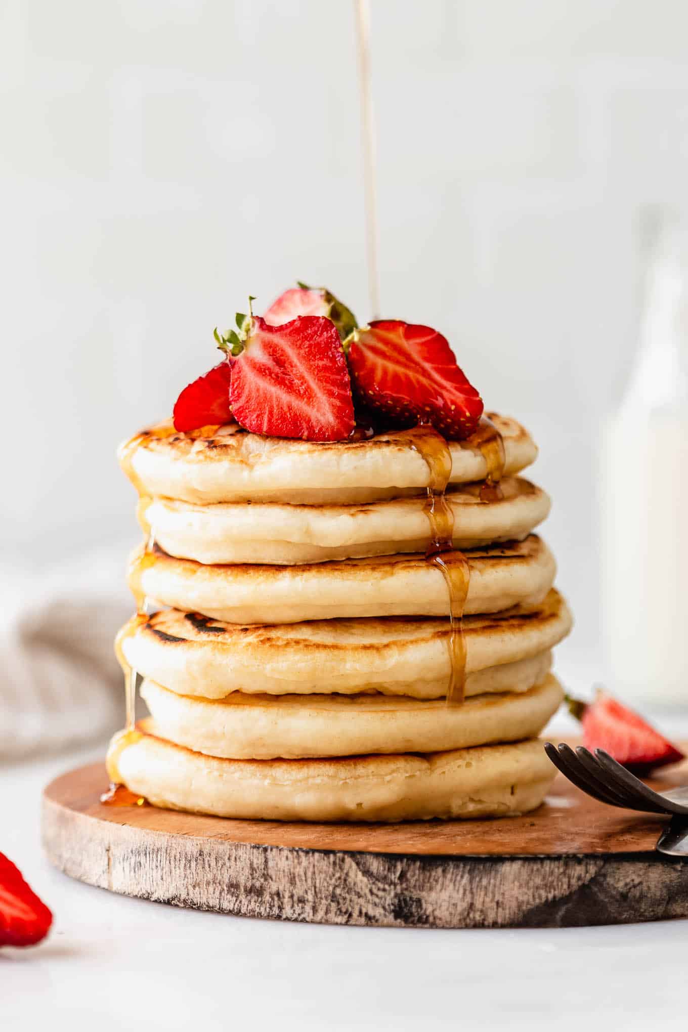 Stack of protein pancakes on cutting board