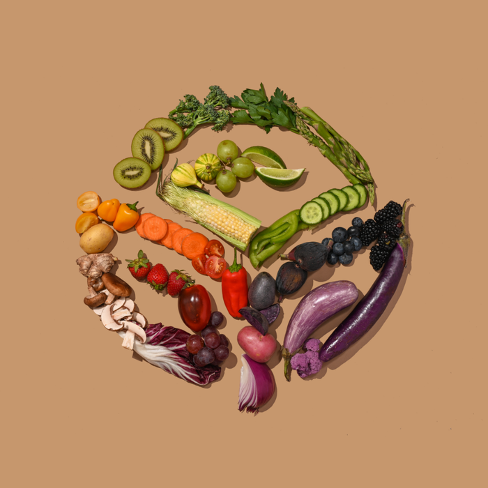 Veges and fruit in shape of natures sunshine logo