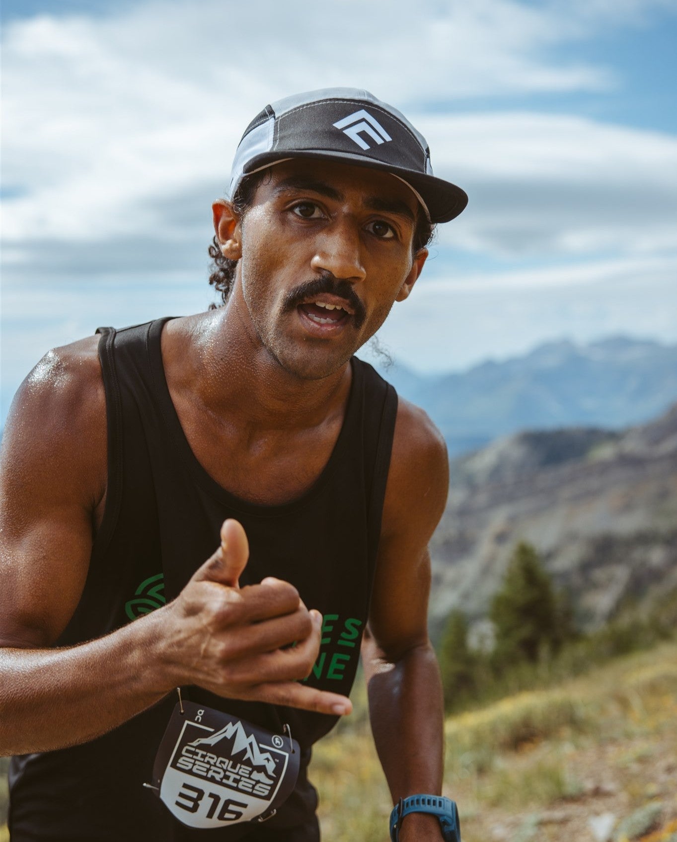 Healthy man running in race