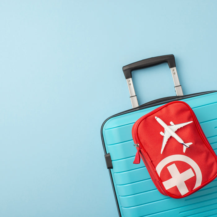 Suitcase and first aid kit