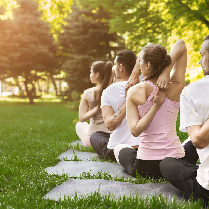 People outside during yoga