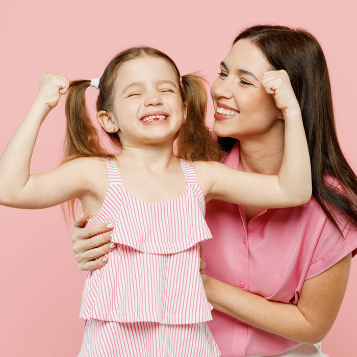 Happy mum and young daughter