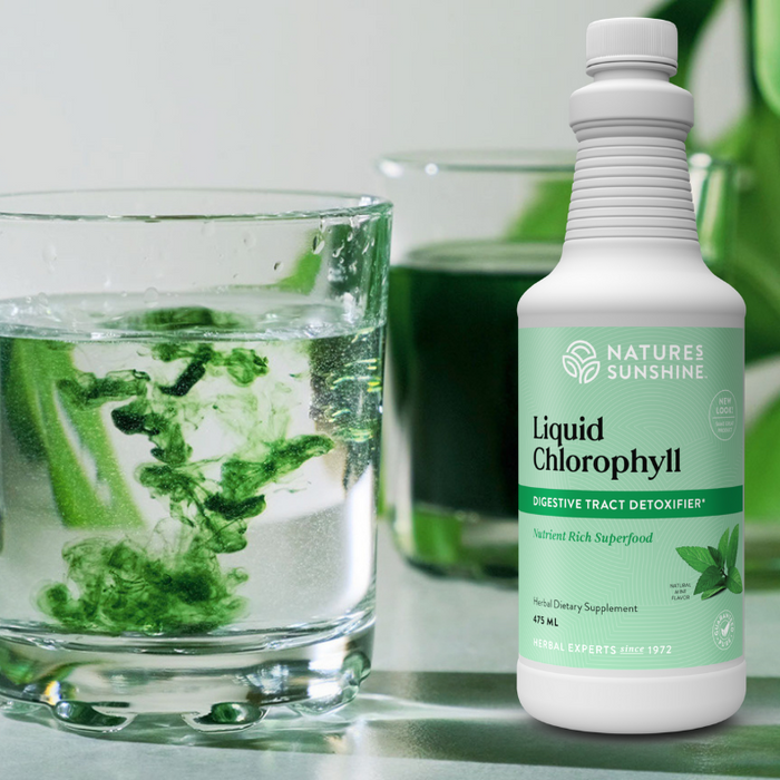Natures Sunshine liquid chlorophyll bottle and glass 
