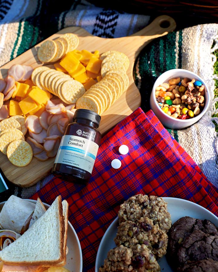 Natures Sunshine Stomach Comfort on picnic table